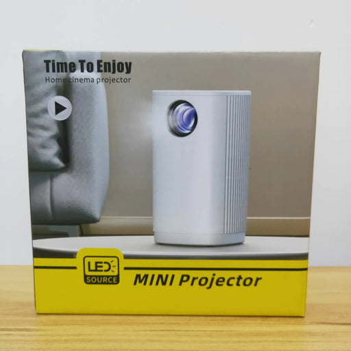 T1 Compact HD Wireless Projector portable mini home cinema projector with LED source in white.