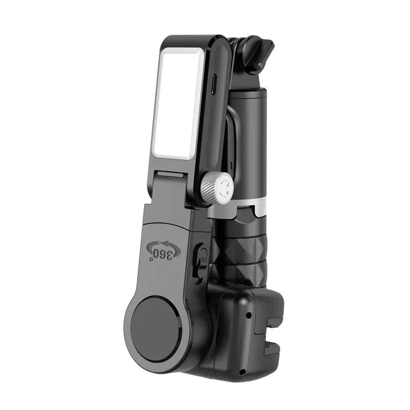 Compact black Q18 Face Tracking selfie stabilizer with integrated light and adjustable phone holder.