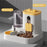 A Two-In-One Device Commonly Used for Feeding Cats And Providing Water, Combining Food And Water in One Unit. It Includes an Automatic Cat Feeder, Feeding And Watering Tools for Cats, Cat Water Dispensers, Bowls And Dishes fo