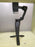 F12 AI-powered foldable gimbal with 3-axis stabilization and compact tripod stand